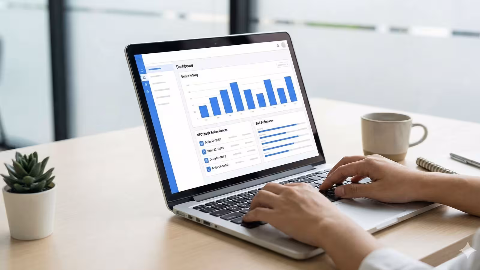 Laptop screen showing a simple dashboard listing NFC Google review devices assigned to staff